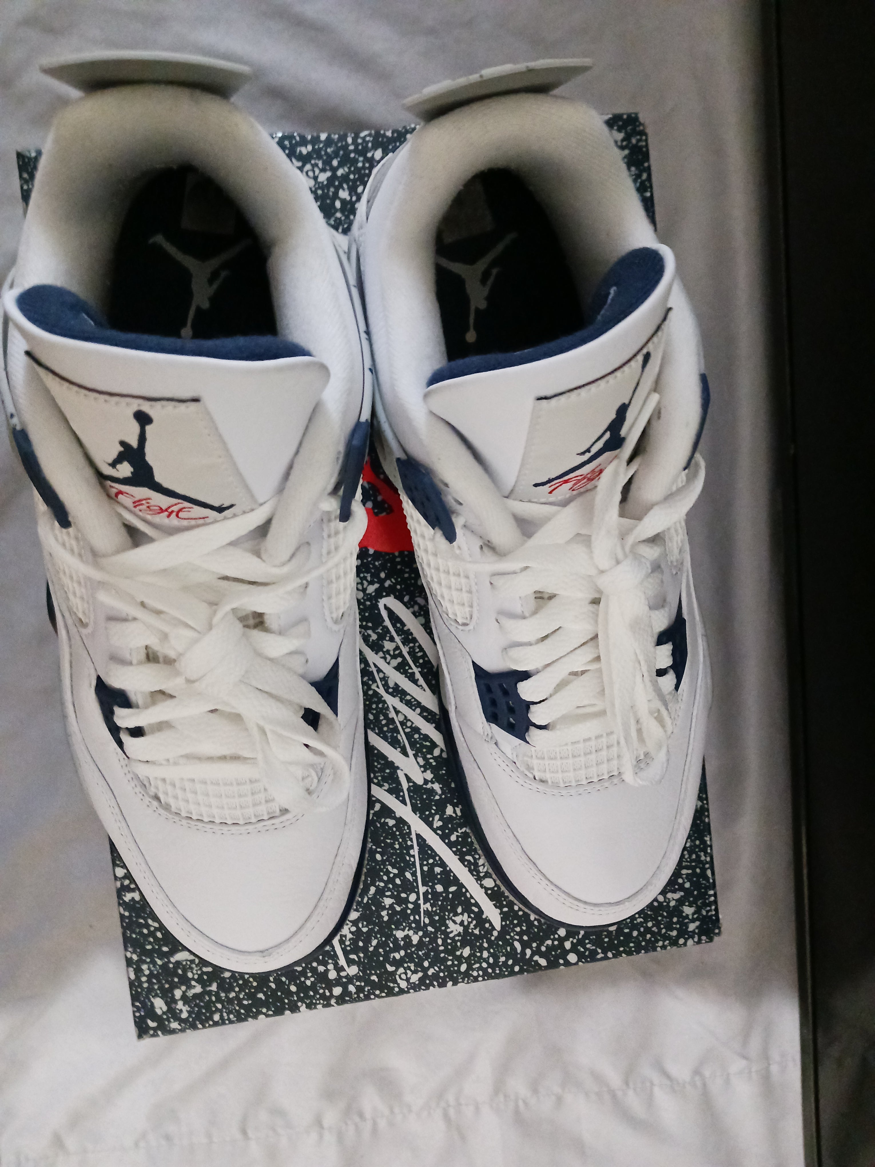 Jordan retro hotsell 4 navy blue